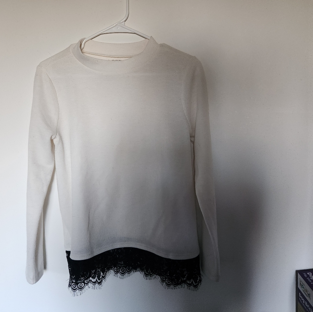 White sweater with black lase